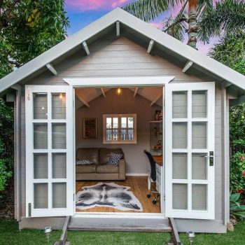 Grey and white kitset cabin