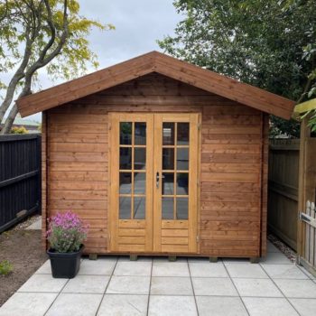 Pressure Treated Star kitset cabin sitting on pavers