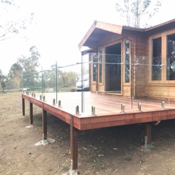 wooden kitset cabin on deck