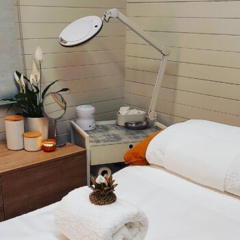 Beauty bed in a kitset cabin beauty studio with waxing set up